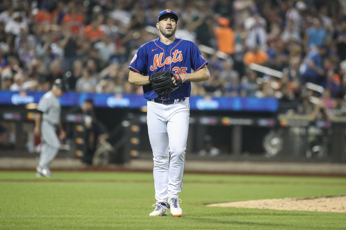 Justin Verlander holds his glove